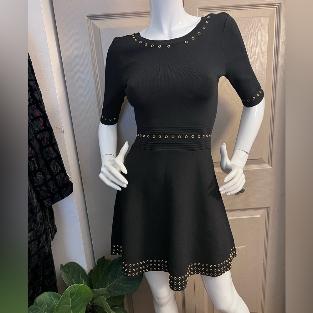 Chic Black Dress with Gold Detailing